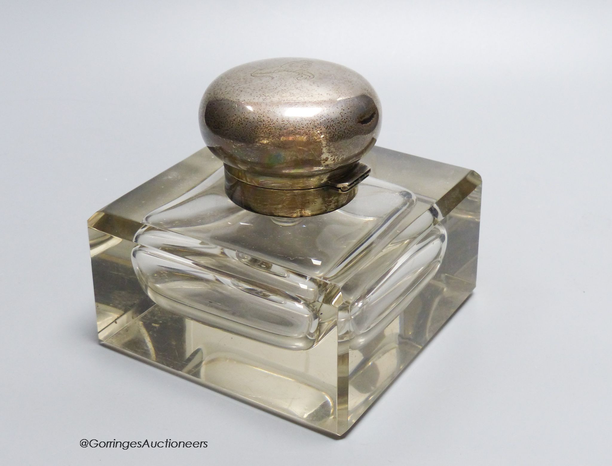A George V large silver topped glass inkwell, makers mark C and co-, London 1912, 12.5 cm wide